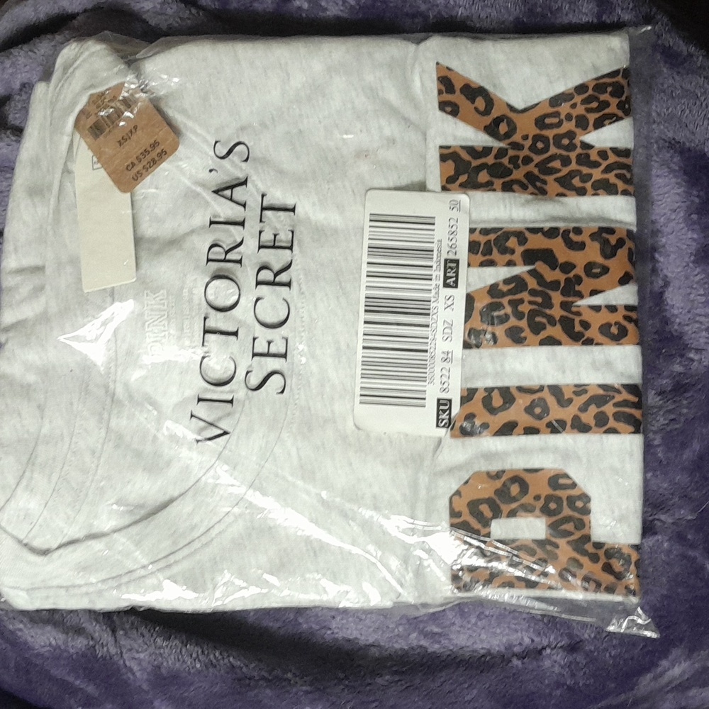 - NwT Pink.  Victoria secret  "pink” tee shirt letters  in animal print